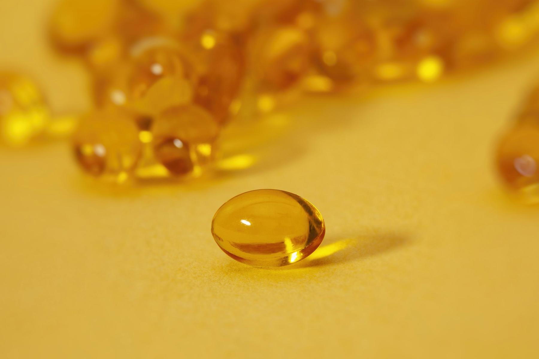 Amber softgel capsules